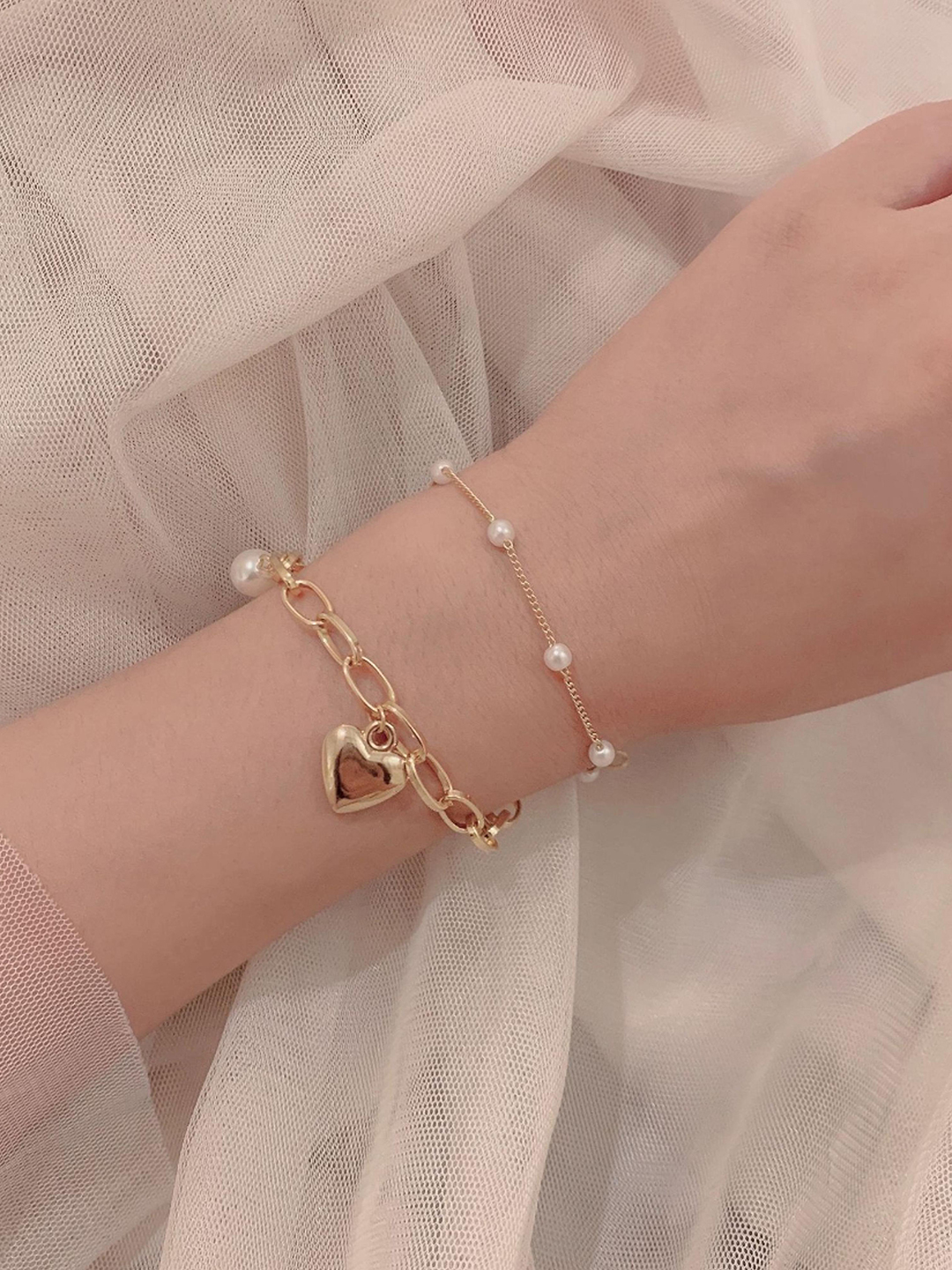 YouBella Jewellery Gold Plated Heart Shape Bracelet for Girls and Women (Gold) (YBBN_91787)